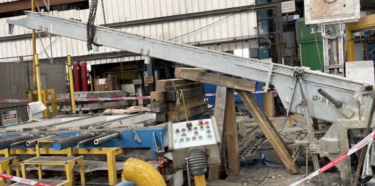 Press Photo Hydraulic Arm Post Incident 768X381