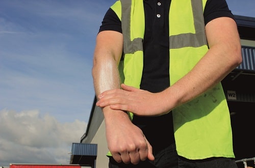 Worker Applying Sunscreen SC Johnson Professional