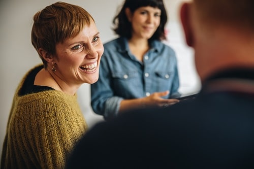 Woman Talking and Laughing iStock/jacoblund