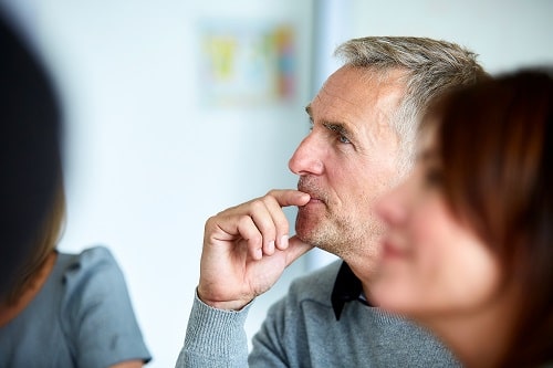 Man Looking Pensive iStock kupicoo