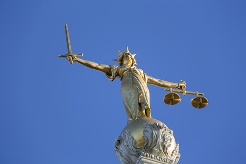 Statue with Sword and Scales iStock _ultraforma_